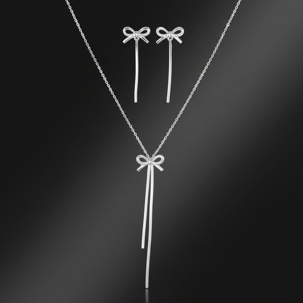 Setje "strik" ketting met oorbellen in goud en zilverkleur