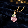 Set Peach" PVD verguld roestvrijstalen ketting en oorbellen