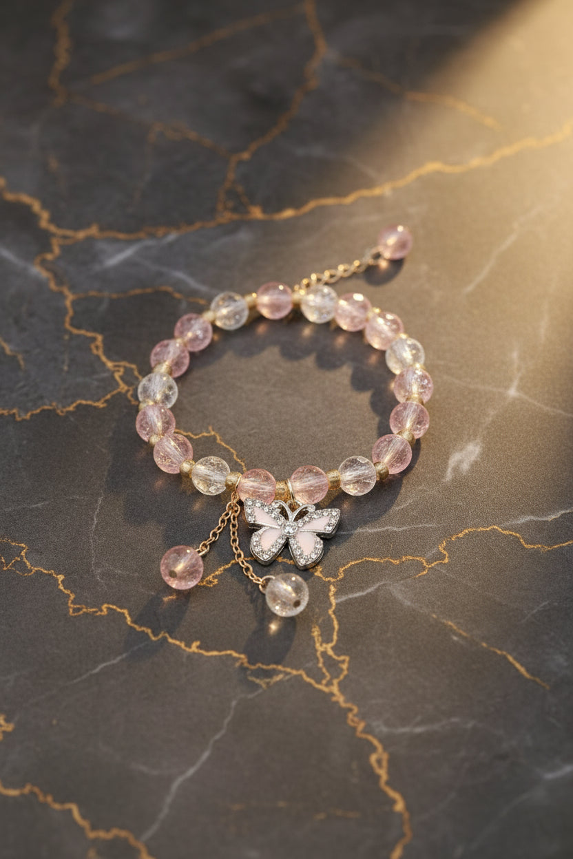 Leuke armband met vlinder bedel