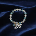 Leuke armband met vlinder bedel