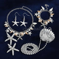 Super leuk complete setje "schelp": tasje, ketting, oorbel, armband en haarclips